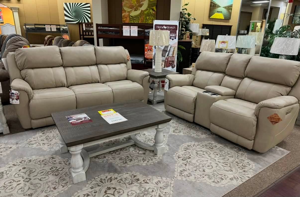 Real reclining sofa and loveseat set at Dave's Furniture showroom