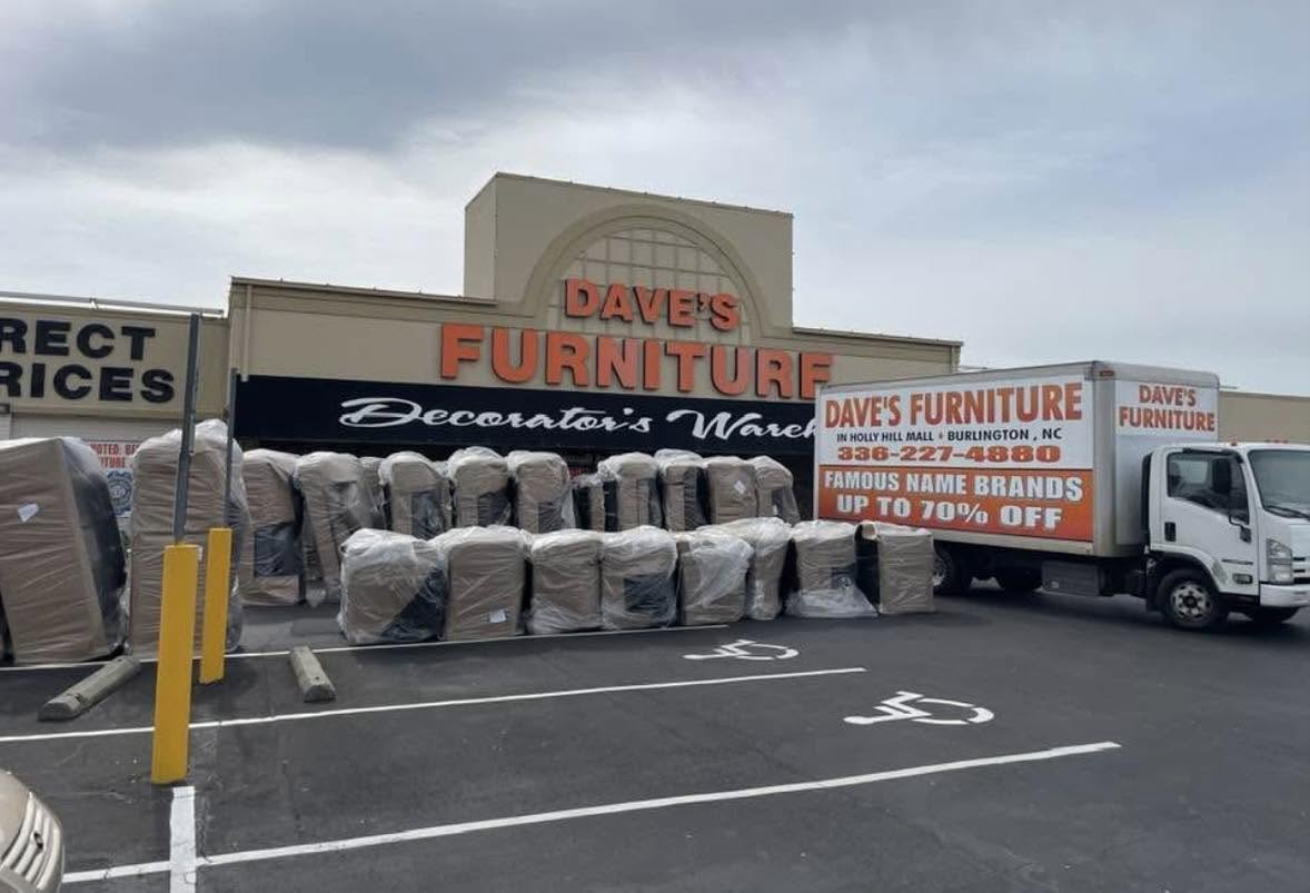 Dave's Furniture real storefront and delivery truck at Holly Hill Mall